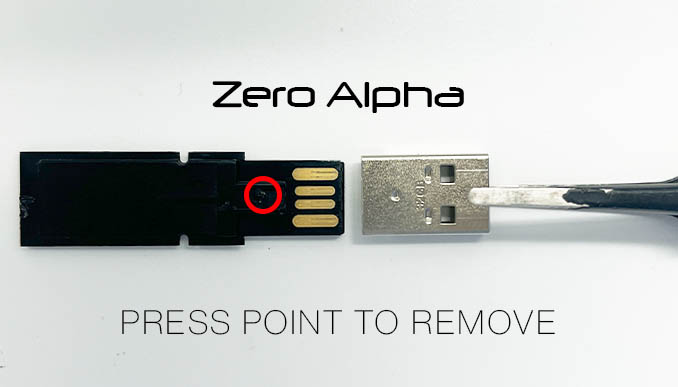 verbatim usb press point with flat tweezers inside usb to remove